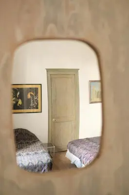 Un ou plusieurs lits dans un hébergement de l'établissement La petite maison