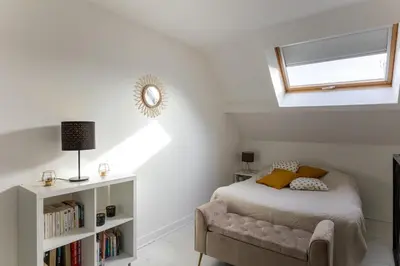 Un ou plusieurs lits dans un hébergement de l'établissement Maison Mareuil