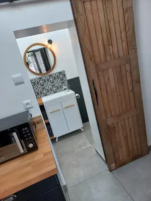 Cuisine ou kitchenette dans l'établissement Villa Cosy Pierrefonds