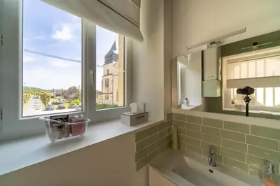 Salle de bains dans l'établissement Le Clos de la Tour