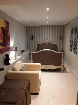 Coin salon dans l'établissement Vakantiewoning Le Chêne