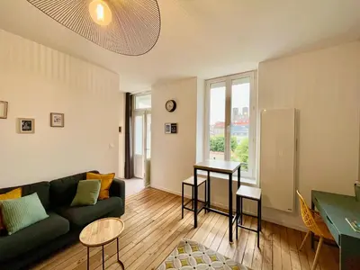 Coin salon dans l'établissement Suite Clovis 6