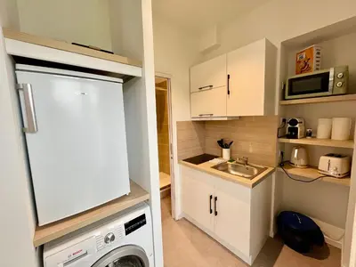 Cuisine ou kitchenette dans l'établissement Suite Clovis 6