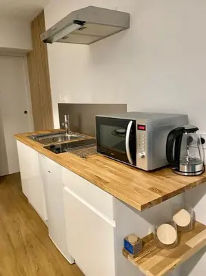 Cuisine ou kitchenette dans l'établissement Détente & Spa