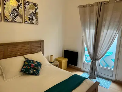 Un ou plusieurs lits dans un hébergement de l'établissement Appartement au calme - Proche centre ville