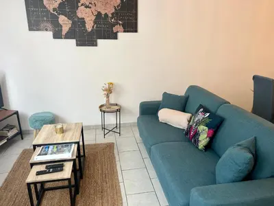 Coin salon dans l'établissement Appartement au calme - Proche centre ville