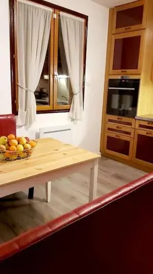 Cuisine ou kitchenette dans l'établissement Le Jardin d'Eden