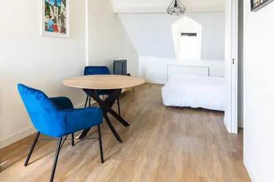 Coin salon dans l'établissement Superbe studio 'Chardonnay' avec vue sur la vallée