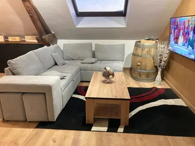 Coin salon dans l'établissement La fine bulle! Magnifique appartement pour votre séjour en CHAMPAGNE