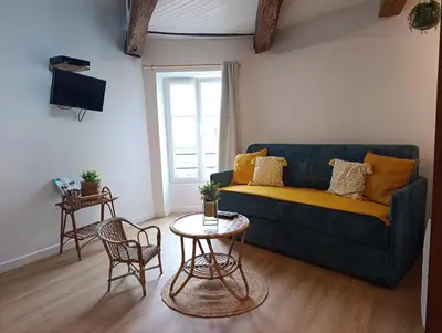 Coin salon dans l'établissement La Marisa, studio cosy 10min Disney.