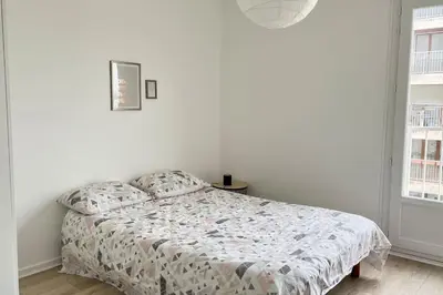 Un ou plusieurs lits dans un hébergement de l'établissement L' escapade Rémoise - Beau 4 pièces refait à neuf