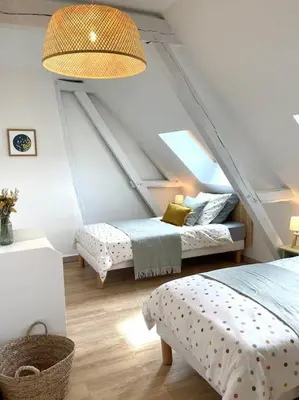 Un ou plusieurs lits dans un hébergement de l'établissement Maison de vacances dans un village de charme