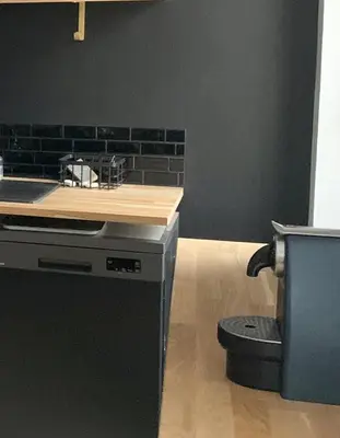 Cuisine ou kitchenette dans l'établissement Champagne! Appartement spacieux Reims centre
