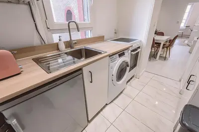 Cuisine ou kitchenette dans l'établissement 2 chambres, proche hyper centre