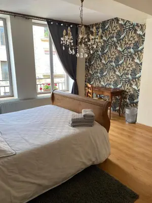 Un ou plusieurs lits dans un hébergement de l'établissement La Chambre d'Angèle Chambres d'hôtes