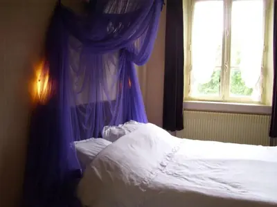 Un ou plusieurs lits dans un hébergement de l'établissement Hotel de la Gare