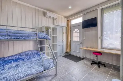Un ou plusieurs lits dans un hébergement de l'établissement Logements ouvriers à la campagne