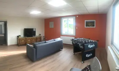 Télévision ou salle de divertissement dans l'établissement Le Gîte Champenois