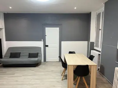 Coin salon dans l'établissement L´ÉMERAUDE 1