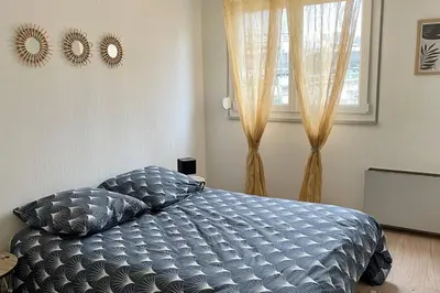 Un ou plusieurs lits dans un hébergement de l'établissement L’esplanade - Super 3 pièces refait à neuf - Reims