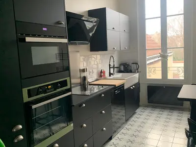 Cuisine ou kitchenette dans l'établissement L Oôte appart