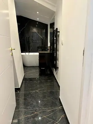 Salle de bains dans l'établissement Bel Appartement avec parking au coeur de Reims