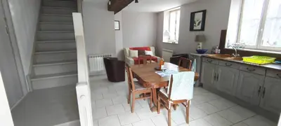 Coin salon dans l'établissement La Hulottière Chouette Gîte