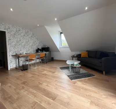 Coin salon dans l'établissement La Chambre du Valois