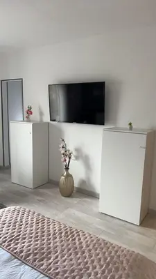 Télévision ou salle de divertissement dans l'établissement Reims Detente