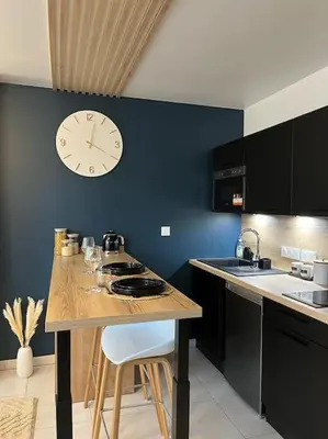 Cuisine ou kitchenette dans l'établissement Petit cocon en hyper-centre