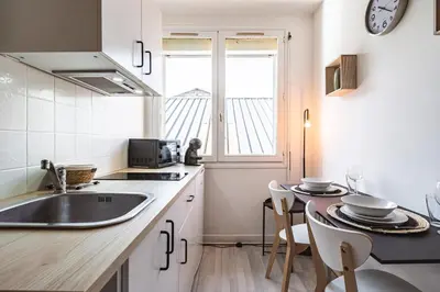 Cuisine ou kitchenette dans l'établissement Bali - Studio agréable et central - Proche Arena