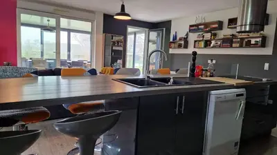 Cuisine ou kitchenette dans l'établissement Au Gré Des Lis