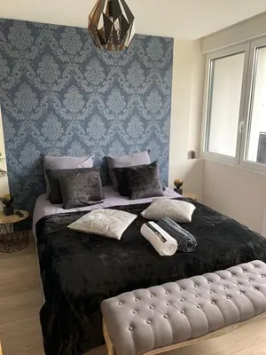 Un ou plusieurs lits dans un hébergement de l'établissement Maison d architecte avec spa