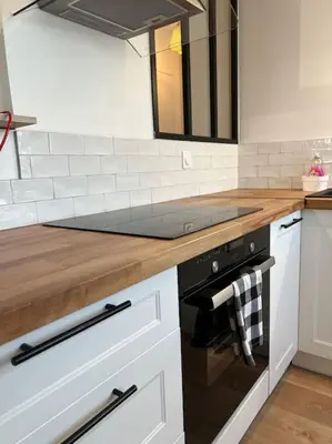Cuisine ou kitchenette dans l'établissement Appartement proche Disneyland