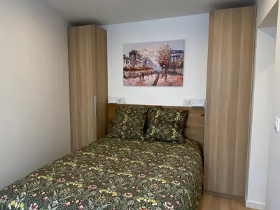 Un ou plusieurs lits dans un hébergement de l'établissement Studio 24m2 avec parking privé - Lycée Roosevelt - Arena - Gare