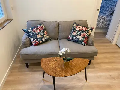 Coin salon dans l'établissement Studio 24m2 avec parking privé - Lycée Roosevelt - Arena - Gare