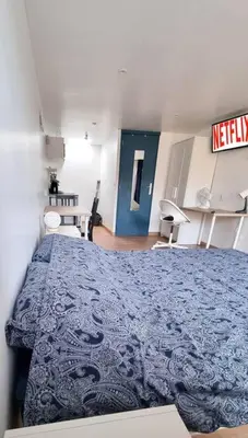 Un ou plusieurs lits dans un hébergement de l'établissement Le petit Château Avesnois - Studio en rez de jardin avec terrasse privée