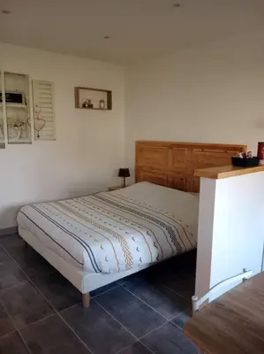 Un ou plusieurs lits dans un hébergement de l'établissement studio zen, détente et relaxation