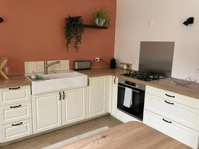 Cuisine ou kitchenette dans l'établissement Lodge de la Vigneronne