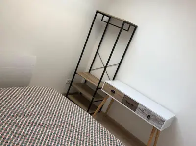Un ou plusieurs lits dans un hébergement de l'établissement Une maison agréable pour se détendre