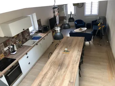 Cuisine ou kitchenette dans l'établissement Une maison agréable pour se détendre