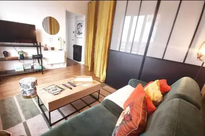 Coin salon dans l'établissement T1 cocooning à l’Hôtel de Ville