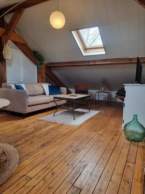 Coin salon dans l'établissement Joli appartement Quai 2 voie C parking gratuit