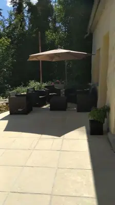 Jardin de l'établissement Gîte aux trois suites parentales et son jacuzzi