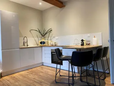 Cuisine ou kitchenette dans l'établissement Appartement Complet Rez-de-chaussée