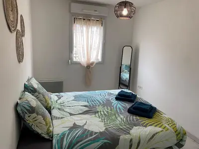 Un ou plusieurs lits dans un hébergement de l'établissement Appartement Avenue de Champagne