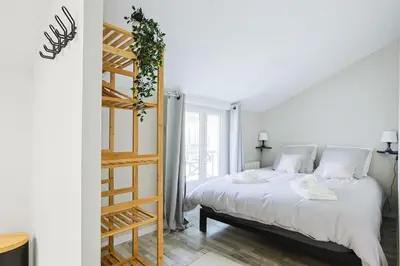 Un ou plusieurs lits dans un hébergement de l'établissement La Maisonnette 20 minutes de Disney