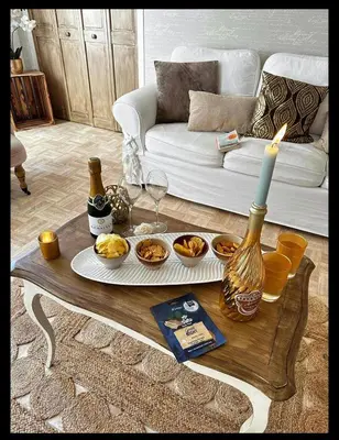 Coin salon dans l'établissement Appartement Un moment d’ÉVAsion