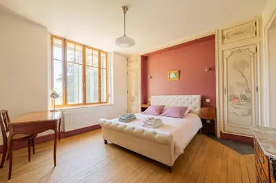 Un ou plusieurs lits dans un hébergement de l'établissement Villa Lenoir
