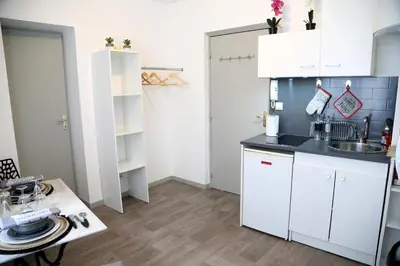 Cuisine ou kitchenette dans l'établissement Le Paradis de l'Isle